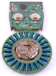 Kepa Karmona, Medalla: Circuito de ordenador, maquinaria de reloj, rotor, cable de acero y fibra óptica. 